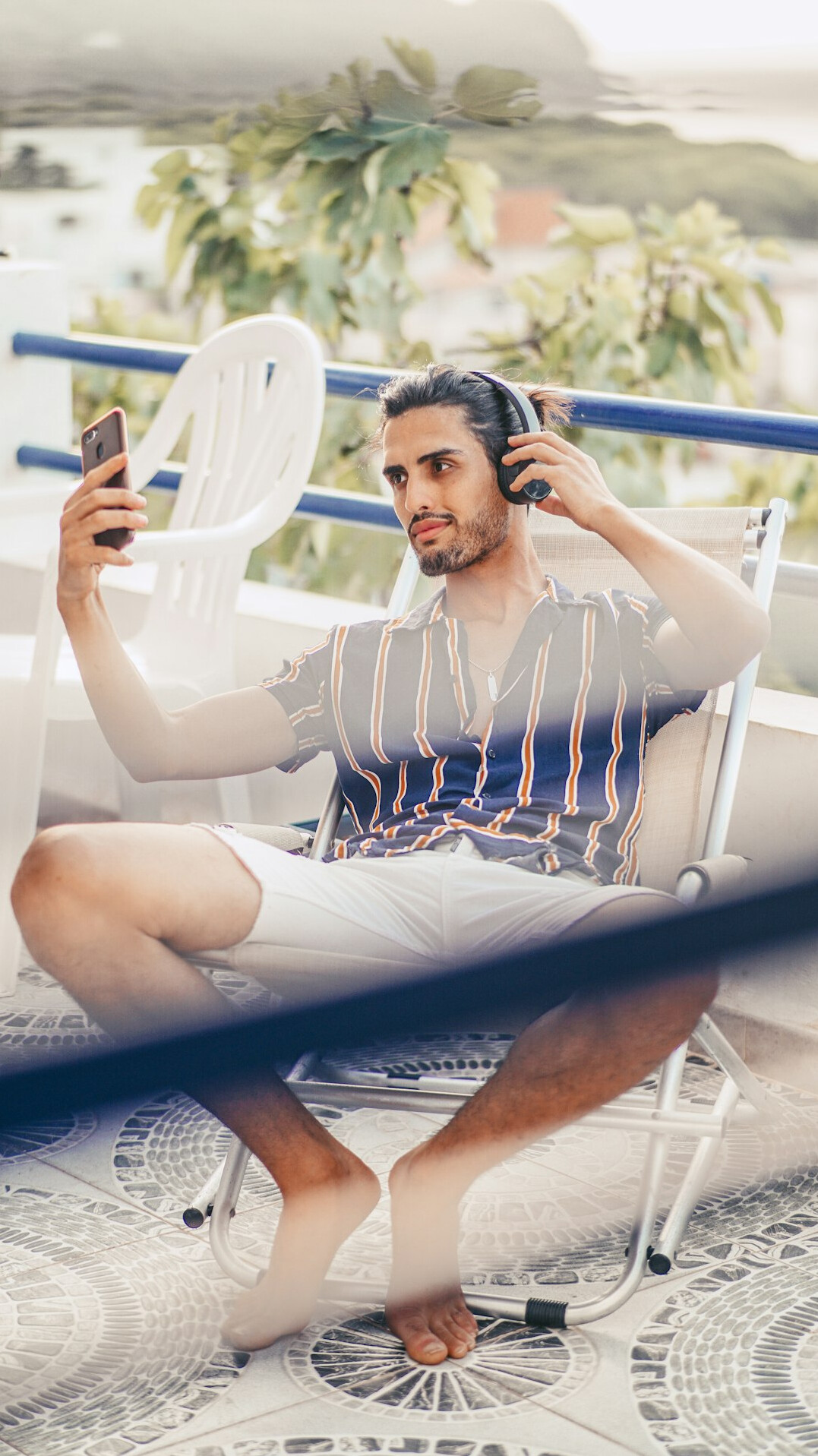 Portrait of a young man video editor with headphones